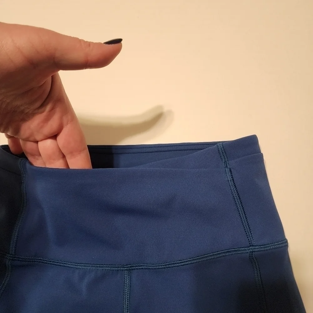 Lululemon size 2 Gear up blue Poseidon cropped leggings with sheer accents